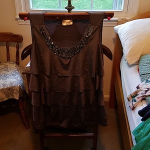 Sleeveless tops with beading